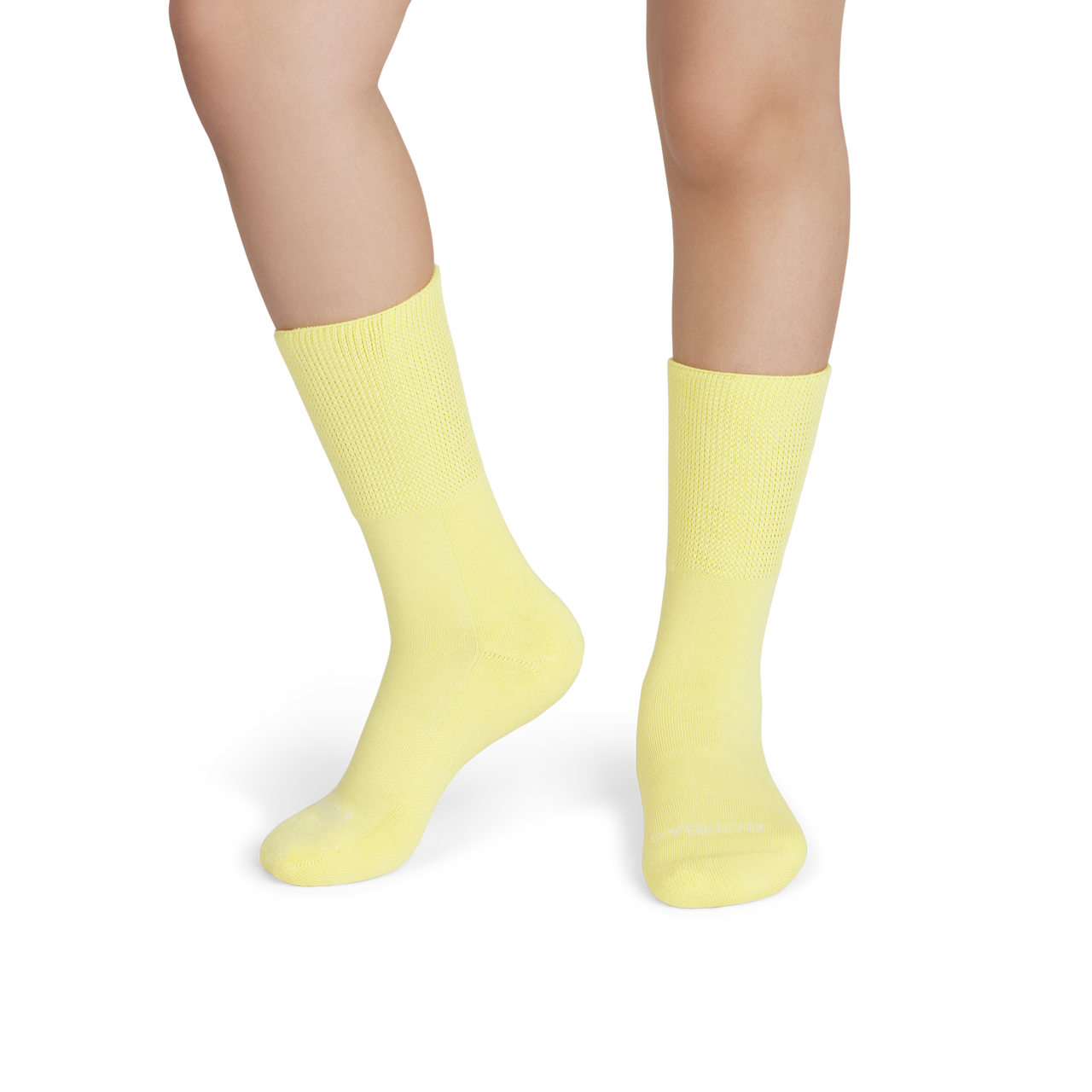 official-bombas::8972-glow-youth-unisex-onmodel-2-transparent.png